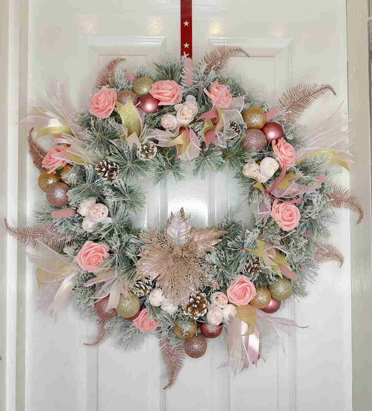 Festive wreath with roses and baubles